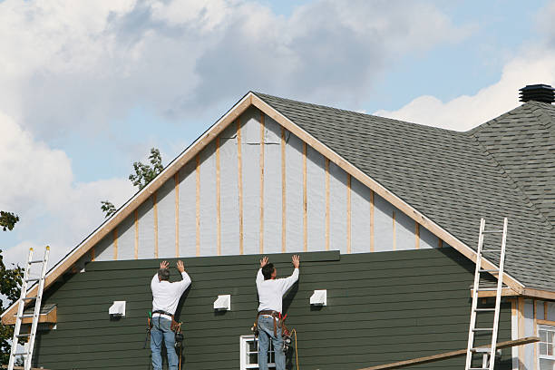 Professional Siding technician working in Moon, VA